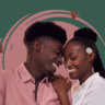 an image of black couple slightly facing each other, both smiling